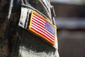 Military uniform with American flag